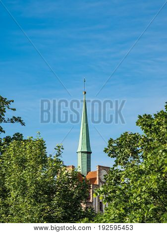 Historical building with blue sky in Rostock Germany.