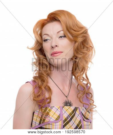 Headshot of a rdhead lady giving a sneer look to the side