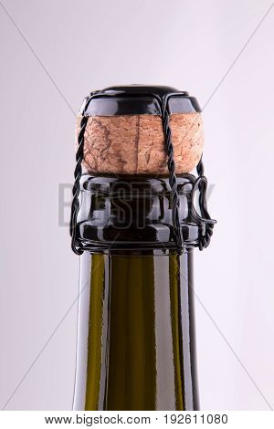 The neck of a bottle of champagne. Bottle of champagne bottles