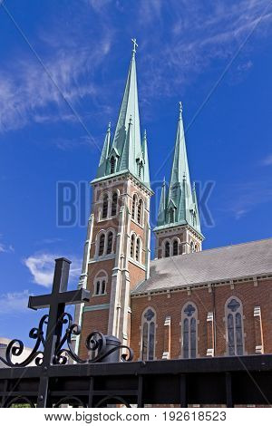 A beautiful church building with twin spires