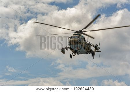 Russian Military Helicopter Mi-8 In The Cloudy Sky