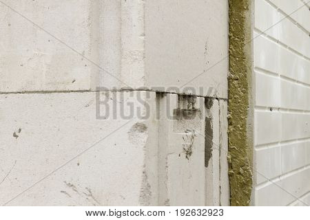 Thermal insulation of a house wall on a building site