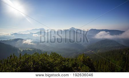 View to mountain ridge during foggy morning, Koschuta, Slovenia