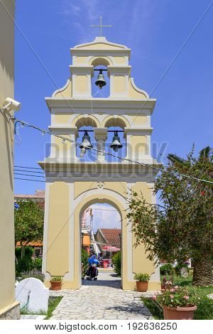 SIDARI, GREECE - MAY 24: View of Bell Tower in Church of St.Nicholas at the Village Square on a sunny day on May 24, 2017 in Sidari, Corfu island in Greece.