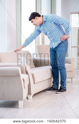 Young man shopping in furniture store