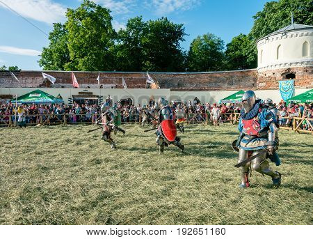TROSTYANETS, UKRAINE - JUNE 25, 2017: Old Castle fest in action. Knights fight just beginning. This is 8 time traditional fest with historical costumes, foods and fights.