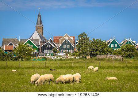 View Of Traditional Dutch Village With Colorful Wooden Houses