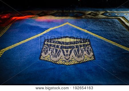 Holy Quran With Beads On A Prayer Mat, Muslim Tasbih Is A String Of Prayer Beads Which Is Traditiona