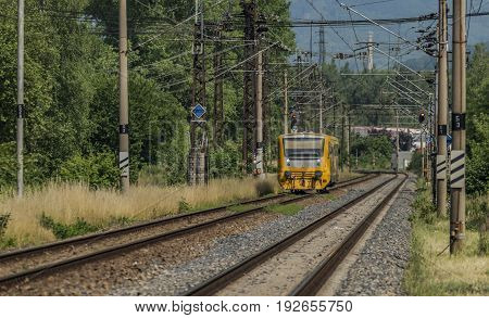 Yellow And Orange Train Near Kostov Station