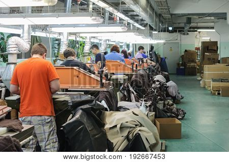 MOSCOW, RUSSIA - FEBRUARY 21, 2017: Moscow shoe factory JSC RALF RINGER. Shop processing of leather blanks.