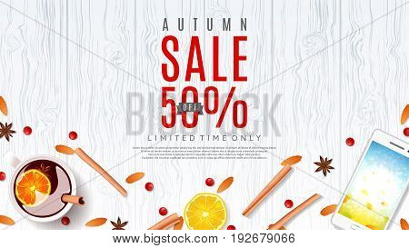 Autumn sale beautiful web banner. Top view on composition with cup of mulled wine, orange, rowan, cinnamon sticks on wooden texture. Vector illustration.