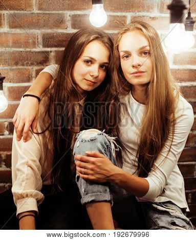 best friends teenage girls together having fun, posing emotional on white background, besties happy smiling, lifestyle people concept close up