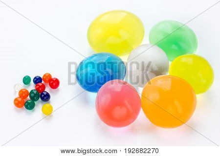 Hydrogel balls small and big isolated on white background