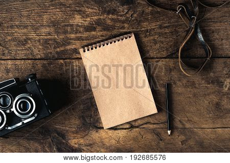 Retro Camera And Equpment On A Wooden Background