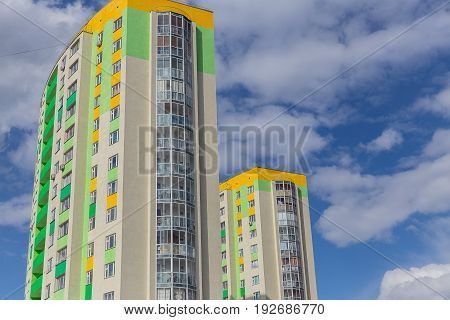 Apartment Building.multistoried Modern And Stylish Living Block Of Flats. Real Estate. New House. Re