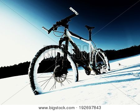 Extremme Contrast. Mountain Bike Stay In Powder Snow. Lost Path  In Deep Snowdrift.