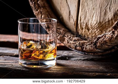 Glass Of Good Brendy With Ice In The Distillery Basement