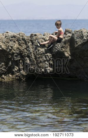 Girl Climbed On Some Rocks