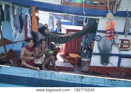 PHU QUOC, VIETNAM - March 21, 2017: Lifestyle of fishermen on their boats in An Thoi pier village, Phu Quoc island, Vietnam