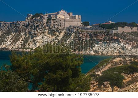 A view of San Nicola island from the nearby San Domino island, with the Abbey of Santa Maria a Mare fortified complex