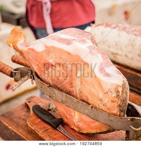 Raw Ham In The Vise Ready To Be Sliced.