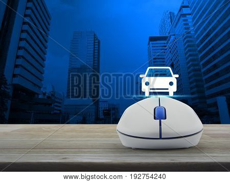 Car flat icon with wireless computer mouse over modern office city tower Internet transportation service concept
