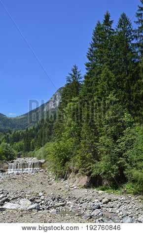 The mid-June rural landscape of the Carnic Alps near Pontebba Friuli Venezie Giulia north east Italy.