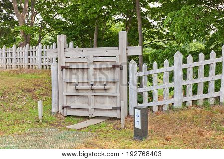 HACHINOHE JAPAN - MAY 23 2017: Reconstructed West Gate and palisade wall of Ne Castle in Hachinohe Japan. Castle was founded in 1334 by Nanbu Moroyuki abandoned in 17th c.