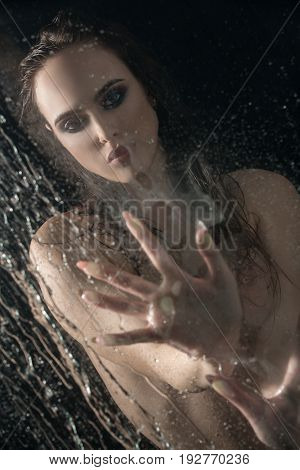 Gorgeous longhaired brunette shot nude in studio aquazone