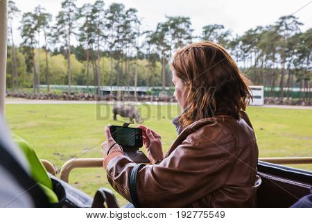 People On The Attrections In Safary Park Serengeti In Germany In