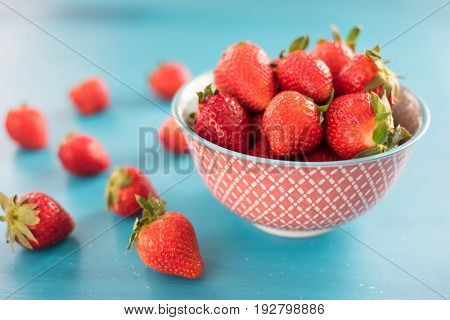 Ripe red strawberries on wooden table, Fresh strawberry, Strawberries in white bowl.