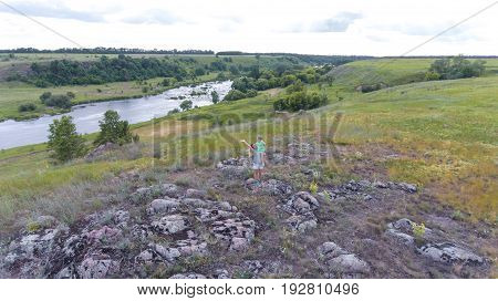 The Girl On The Stone Is The View From The Top