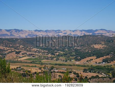 Panoramic mountain view from the top of hill.
