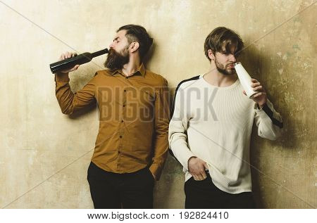 Men Or Bearded Friends Drinking From Bottles