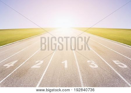 Gray treadmill at the stadium with the numbering from one to five