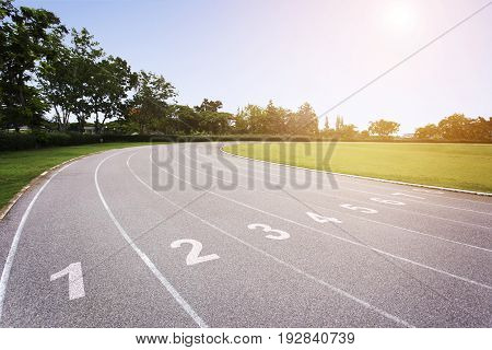 Gray treadmill at the stadium with the numbering from one to eight