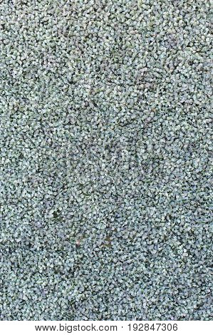 Artificial grass is made of large green plastic. texture background