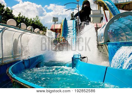 France Paris. August 3 2012. Amusement Park in the Tuileries gardens. Visitors enjoy rides in the Tuileries garden. Editorial