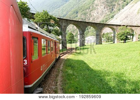 Bernina Express Train At Brusio On The Swiss Alps