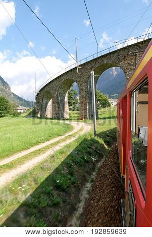 Bernina Express Train At Brusio On The Swiss Alps