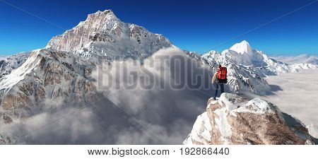 Young man up the mountain admiring the winter landscape. This is a 3d render illustration