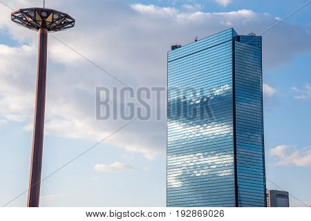 OsakaJapan - November 28 2015 : Osaka city skyline overlook from Osaka Castle Park in Osaka Japan.