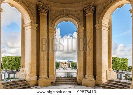 View through main basin monument arcs on Peyrou park with statue at Montpellier southern France