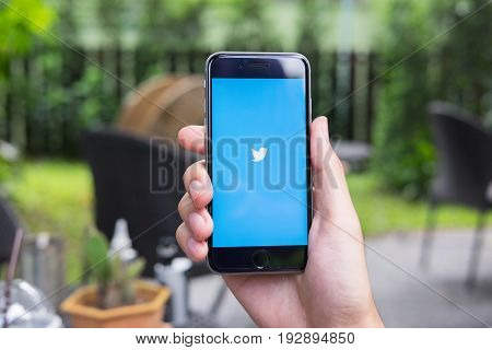 Chiang Mai, Thailand - June 16, 2017: Person Holding A Brand New Apple Iphone With Twitter Logo On T