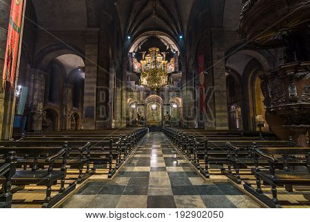 MAASTRICHT NETHERLANDS - JANUARY 13 2016: Interior of Basilica of Our Lady of the Assumption. The oldest church of the Netherlands. Construction started shortly after 1000 AD.
