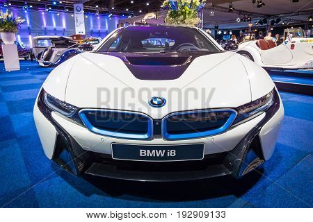 MAASTRICHT NETHERLANDS - JANUARY 14 2016: Plug-in hybrid sports car BMW i8. International Exhibition InterClassics & Topmobiel 2016