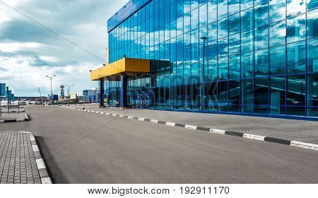 Skyscraper windows with reflection of the sky. Modern buildings.