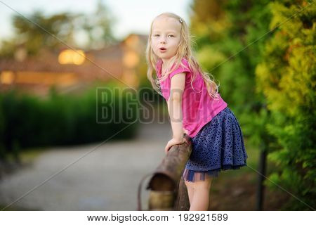 Cute Little Girl Having Fun In Lonato Del Garda, A Small Town And Comune In The Province Of Brescia,