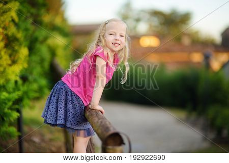 Cute Little Girl Having Fun In Lonato Del Garda, A Small Town And Comune In The Province Of Brescia,