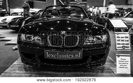 MAASTRICHT NETHERLANDS - JANUARY 14 2016: Compact luxury sports car BMW Z3M 1999. Black and white. International Exhibition InterClassics & Topmobiel 2016